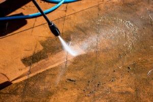 Cleaning,Backyard,Paving,Tiles,Pathway,With,High,Pressure,Washer,Cleaner.